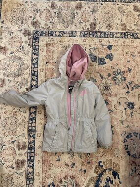 Nike Girls' Light Gray Hooded Rain Jacket with Pink Lining